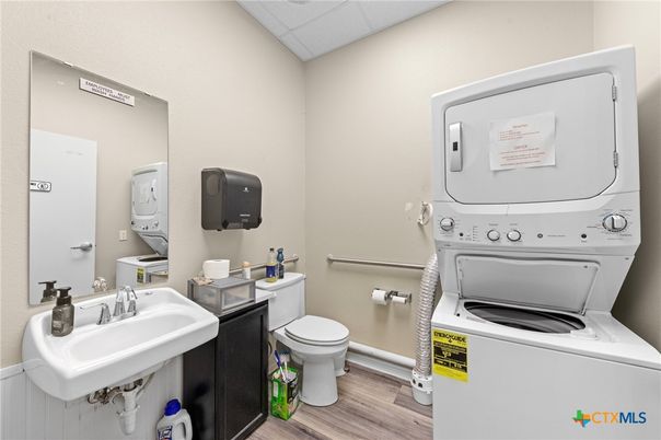 Bathroom, Interior, Utility Closets, Washer, Wood Texture Flooring