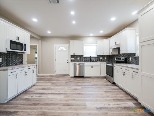 Interior, Kitchen, Recessed Lighting, Stainless Steel Appliances, Wood Texture Flooring