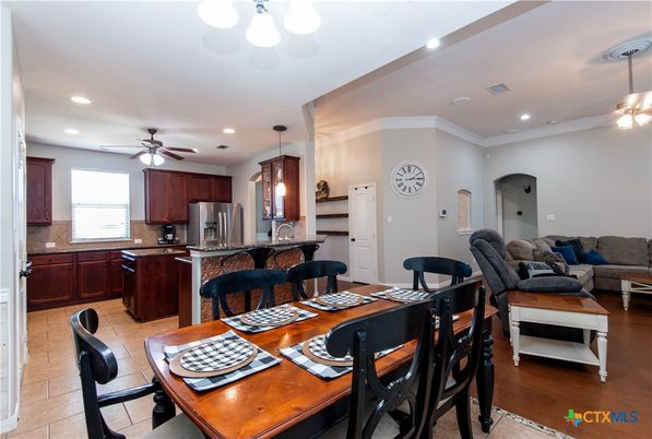 Dining room, Interior, Kitchen, Living room, Pendant Lights, Recessed Lighting, Stainless Steel Appliances, Wood Texture Flooring