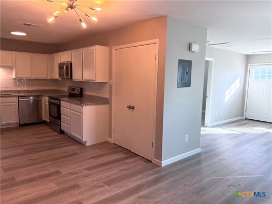 Interior, Kitchen, Recessed Lighting, Stainless Steel Appliances, Wood Texture Flooring