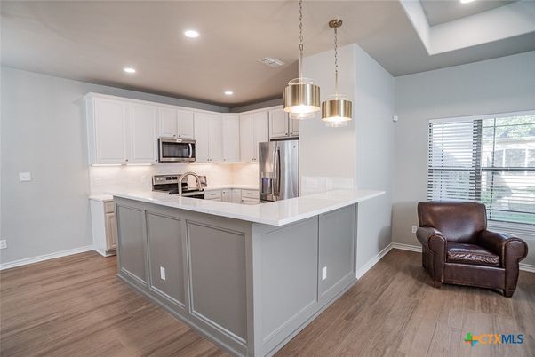 Interior, Kitchen, Pendant Lights, Recessed Lighting, Stainless Steel Appliances, Wood Texture Flooring