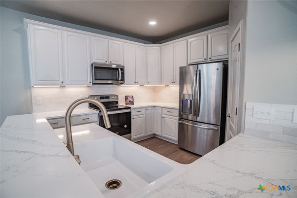Interior, Kitchen, Marble, Recessed Lighting, Stainless Steel Appliances, Wood Texture Flooring