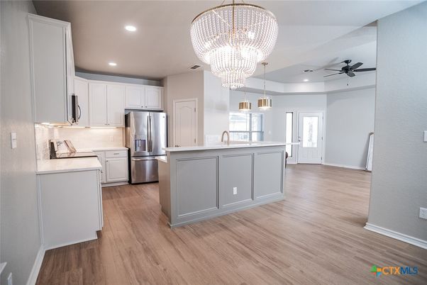 Chandelier, Interior, Kitchen, Pendant Lights, Recessed Lighting, Stainless Steel Appliances, Wood Texture Flooring