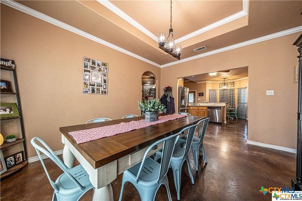 Chandelier, Dining room, Interior, Kitchen, Pendant Lights, Stainless Steel Appliances, Wood Texture Flooring
