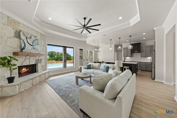 Fireplace, Interior, Kitchen, Living room, Pendant Lights, Recessed Lighting, Stone Walls, Wood Texture Flooring