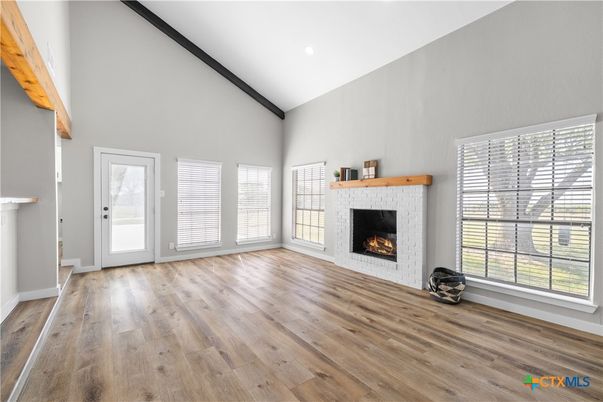 Empty room, Fireplace, Interior, Recessed Lighting, Wood Texture Flooring