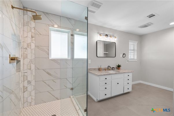 Bathroom, Dual Sink Vanities, Glass Shower, Interior, Marble Walls, Recessed Lighting
