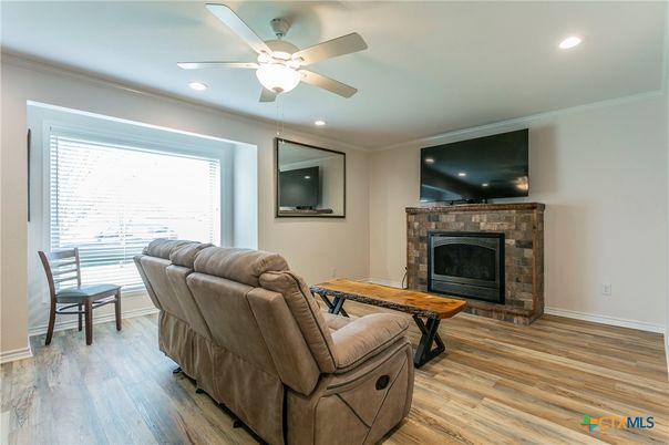 Fireplace, Interior, Living room, Recessed Lighting, Wood Texture Flooring