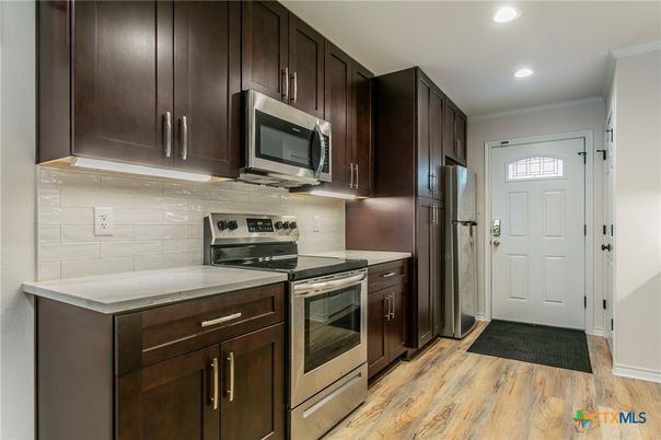 Interior, Kitchen, Recessed Lighting, Stainless Steel Appliances, Wood Texture Flooring
