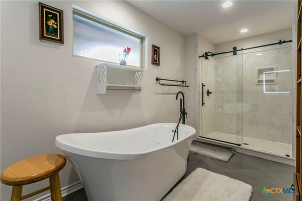 Bathroom, Free Standing Baths, Glass Shower, Interior, Marble Walls, Recessed Lighting