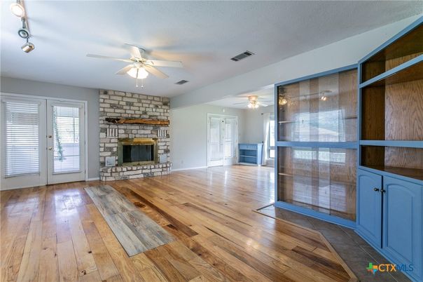 Empty room, Fireplace, Interior, Stone Walls, Wood Texture Flooring