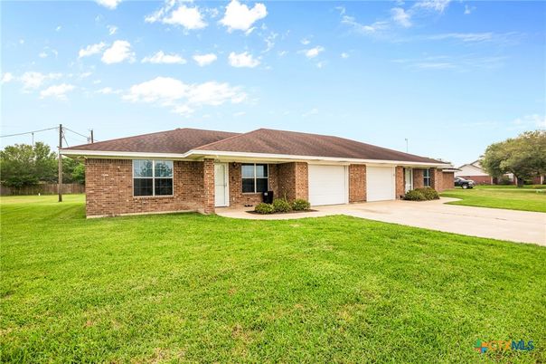 Attached, Backyard, Exterior, Facade, Brick Facade, Ranch