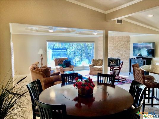 Dining room, Fireplace, Interior, Living room, Recessed Lighting, Stone Walls