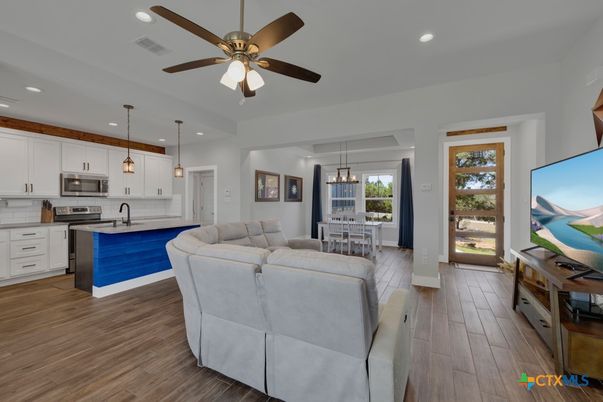 Dining room, Interior, Kitchen, Living room, Pendant Lights, Recessed Lighting, Stainless Steel Appliances, Wood Texture Flooring