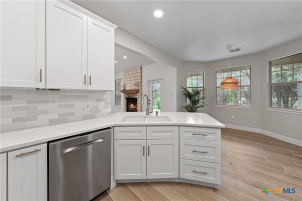 Fireplace, Interior, Kitchen, Pendant Lights, Recessed Lighting, Wood Texture Flooring