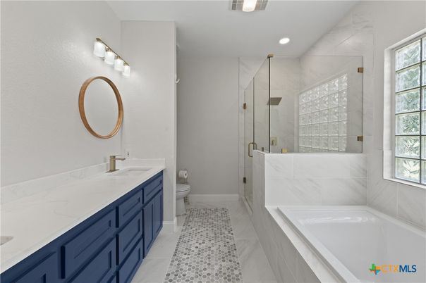 Bathroom, Dual Sink Vanities, Glass Shower, Interior, Marble Walls, Recessed Lighting