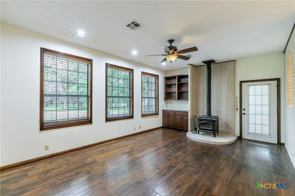 Empty room, Fireplace, Interior, Recessed Lighting, Wood Texture Flooring