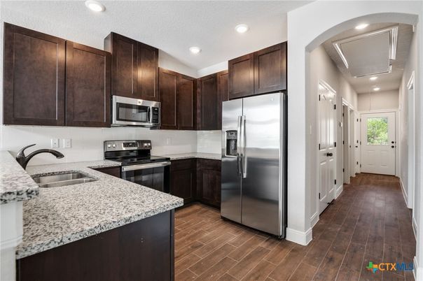 Interior, Kitchen, Recessed Lighting, Stainless Steel Appliances, Wood Texture Flooring