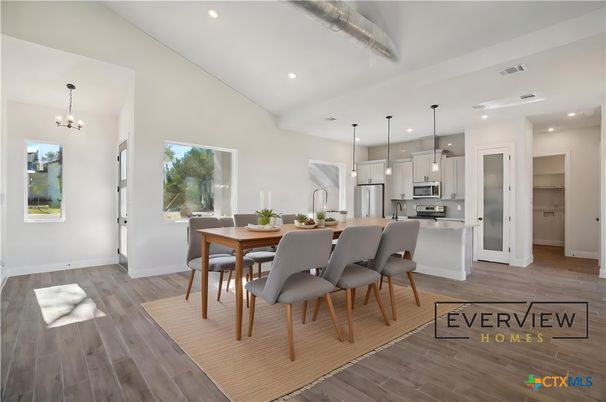 Dining room, Interior, Kitchen, Pendant Lights, Recessed Lighting, Stainless Steel Appliances, Wood Texture Flooring
