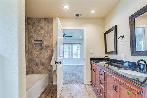 Bathroom, Dual Sink Vanities, Interior, Recessed Lighting, Wood Texture Flooring