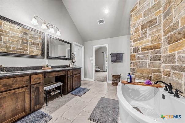 Bathroom, Dual Sink Vanities, Interior, Recessed Lighting, Stone Walls