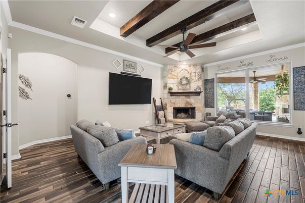 Fireplace, Interior, Living room, Recessed Lighting, Stone Walls, Wooden Beams, Wood Texture Flooring
