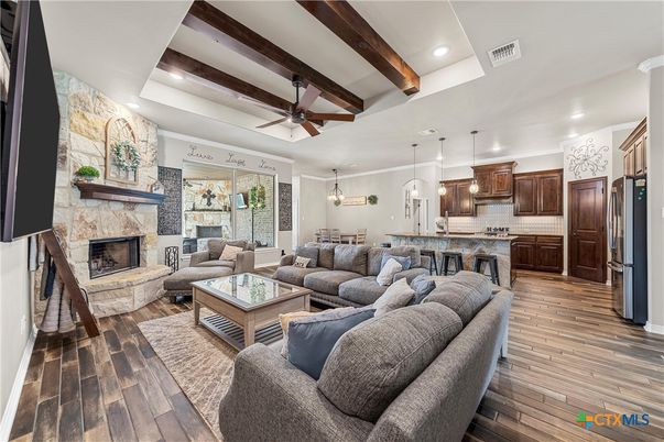 Fireplace, Interior, Kitchen, Living room, Pendant Lights, Recessed Lighting, Stone Walls, Wooden Beams, Wood Texture Flooring