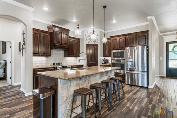 Interior, Kitchen, Pendant Lights, Recessed Lighting, Stainless Steel Appliances, Wood Texture Flooring