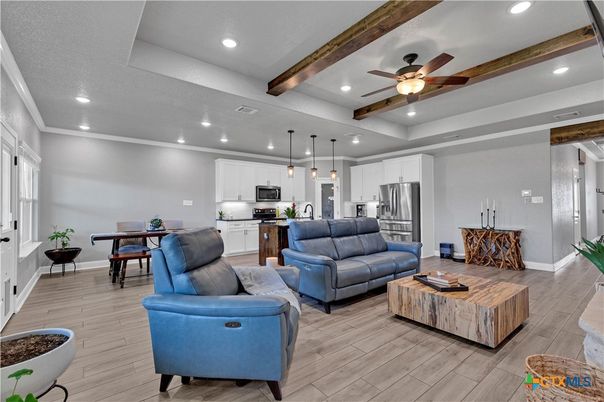 Dining room, Interior, Kitchen, Living room, Pendant Lights, Recessed Lighting, Stainless Steel Appliances, Wooden Beams, Wood Texture Flooring