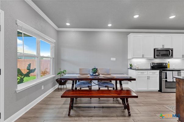 Dining room, Interior, Kitchen, Recessed Lighting, Stainless Steel Appliances, Wood Texture Flooring