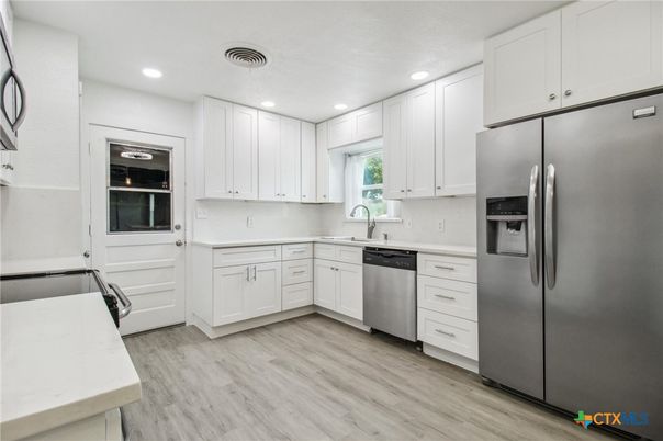 Interior, Kitchen, Recessed Lighting, Stainless Steel Appliances, Wood Texture Flooring