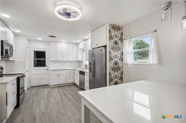 Interior, Kitchen, Recessed Lighting, Stainless Steel Appliances, Wood Texture Flooring
