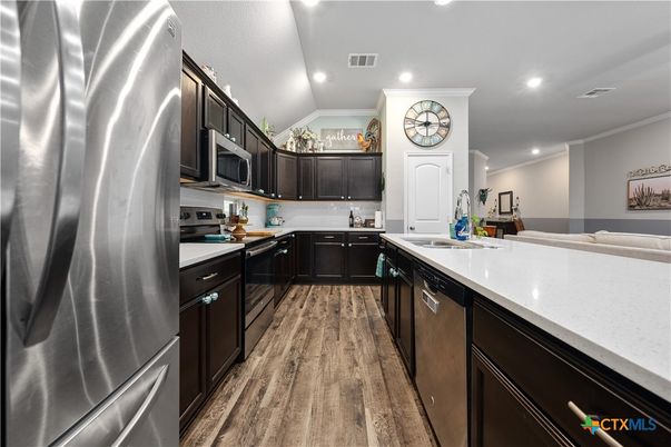 Interior, Kitchen, Recessed Lighting, Stainless Steel Appliances, Wood Texture Flooring