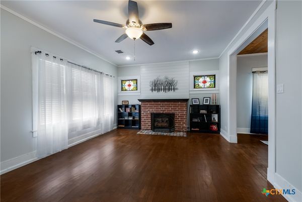 Empty room, Fireplace, Interior, Recessed Lighting, Stone Walls, Wood Texture Flooring