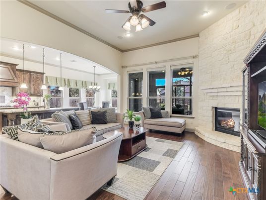 Chandelier, Fireplace, Interior, Kitchen, Living room, Pendant Lights, Recessed Lighting, Stone Walls, Wood Texture Flooring