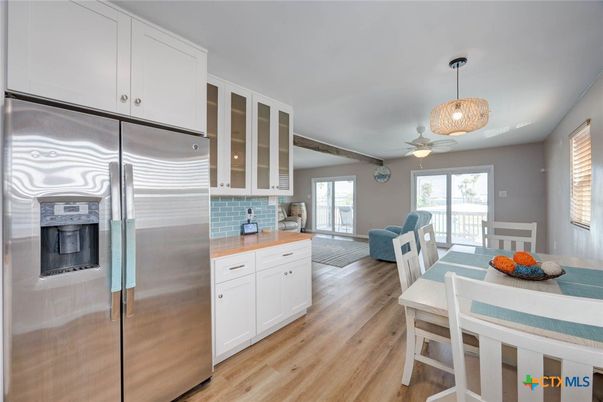 Dining room, Interior, Kitchen, Pendant Lights, Stainless Steel Appliances, Wood Texture Flooring