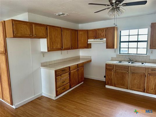 Interior, Kitchen, Tile Countertops, Wood Texture Flooring