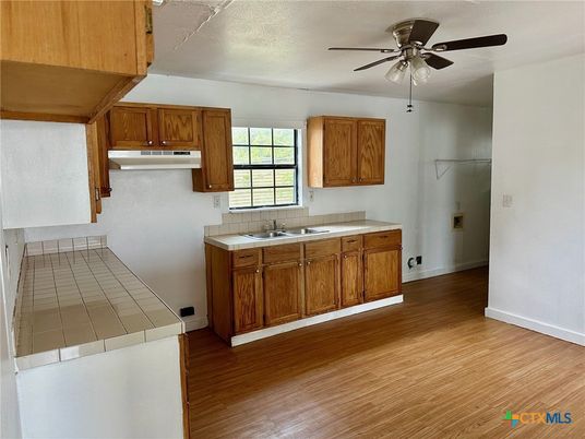 Interior, Kitchen, Tile Countertops, Wood Texture Flooring