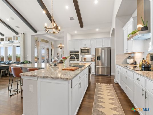 Chandelier, Dining room, Interior, Kitchen, Pendant Lights, Recessed Lighting, Stainless Steel Appliances, Wooden Beams, Wood Texture Flooring