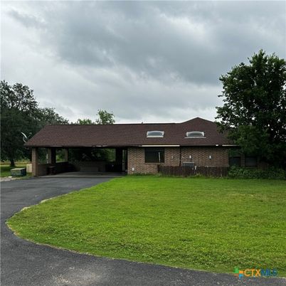 Attached, Backyard, Exterior, Facade, Brick Facade, Ranch