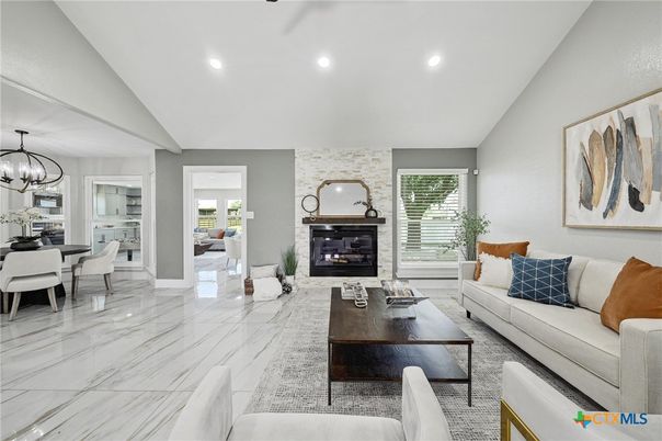 Chandelier, Dining room, Fireplace, Interior, Living room, Marble, Recessed Lighting, Stone Walls