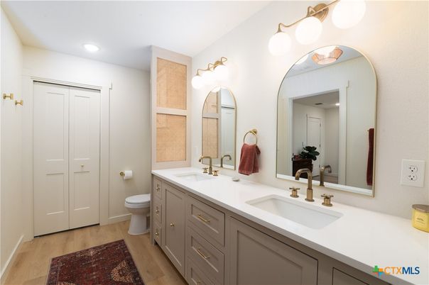 Bathroom, Dual Sink Vanities, Interior, Recessed Lighting, Wood Texture Flooring