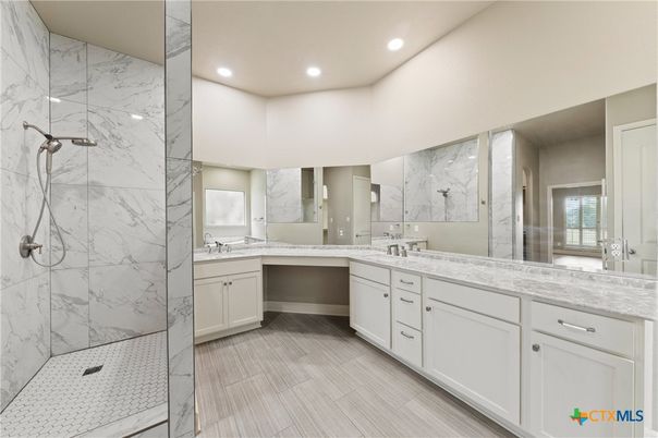 Bathroom, Dual Sink Vanities, Glass Shower, Interior, Marble Walls, Recessed Lighting
