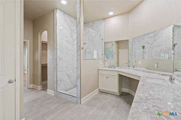 Bathroom, Dual Sink Vanities, Glass Shower, Interior, Marble Walls, Recessed Lighting