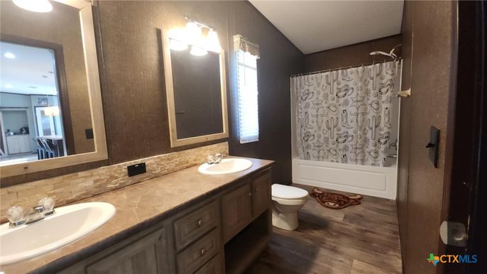 Bathroom, Dual Sink Vanities, Interior, Recessed Lighting, Wood Texture Flooring