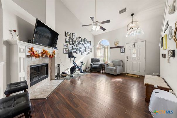 Fireplace, Fitness Equipment, Interior, Pendant Lights, Wood Texture Flooring