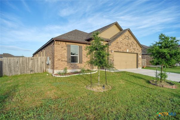 Attached, Backyard, Exterior, Facade, Brick Facade, Brick Traditional