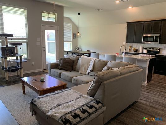 Dining room, Interior, Kitchen, Living room, Pendant Lights, Recessed Lighting, Stainless Steel Appliances, Wood Texture Flooring