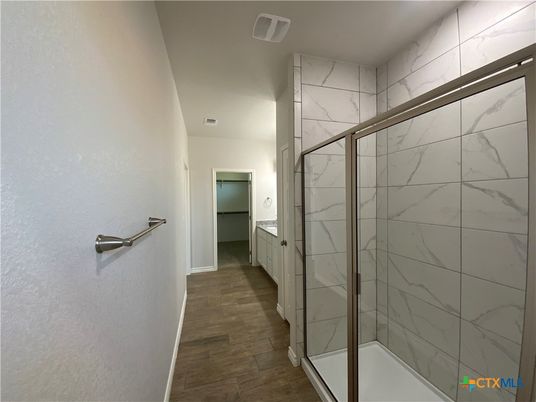Bathroom, Glass Shower, Interior, Marble Walls, Wood Texture Flooring