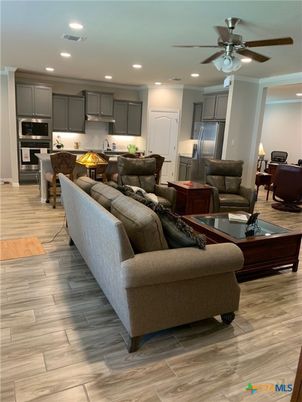 Dining room, Interior, Kitchen, Living room, Recessed Lighting, Stainless Steel Appliances, Wood Texture Flooring